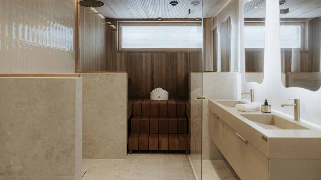 Beautiful and luxurious Tulikivi sauna heater in a wooden and white stone bathroom area